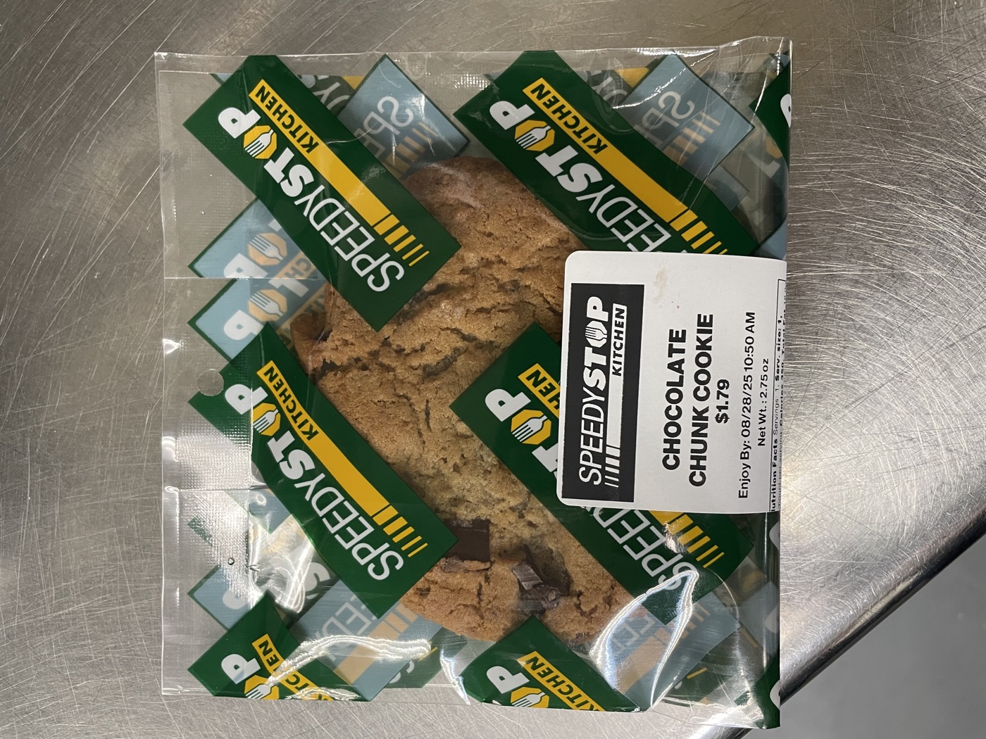 Chocolate chunk cookie in a clear ToasteeWrap cookie bag